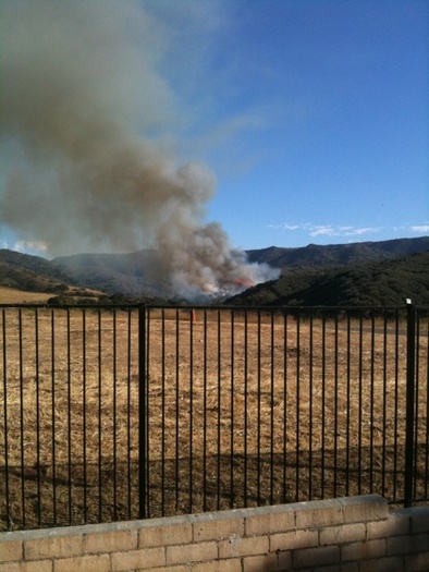 Fire in the hills behind my house - some pics with me