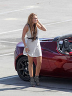 17025905_ETFCQGEVD - Miley Cyrus Photoshoot in a Tesla Roadster