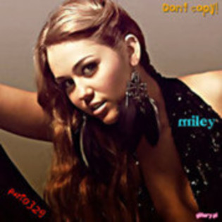 41797363_SEIAOXLOC - miley cyrus glitter and wallpapper