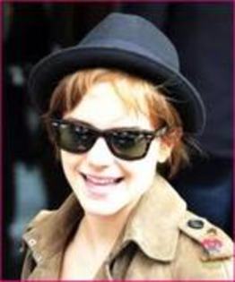 9 - Emma with hats
