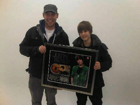 Got surprised in Toronto last night with my first platinum album plaque for MY WORLD. Wow. blessed t