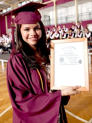Photo of Selena With her Diploma