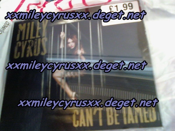 The CD cover - 4 can-t be tamed proofs