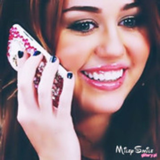 Miley talking on  the phone; Miley talking on the phone
