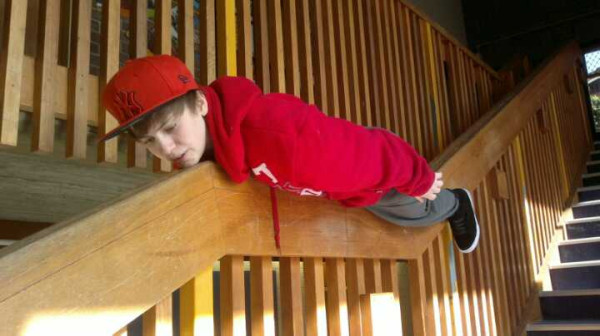scared shitless trying to plank of the ledge of high ass stair rails.