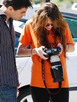 miley-cyrus-paparazzi-photographer-3