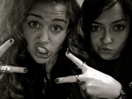 - Peace from Miley and Brandi =]] Hahah