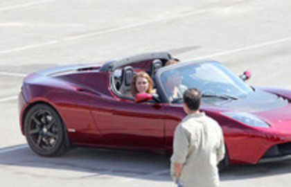 17025874_CTQZOYJVL - Miley Cyrus Photoshoot in a Tesla Roadster