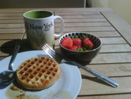 Mmmmmm yummmness. Whole grain waffle, strawberries, and coffee