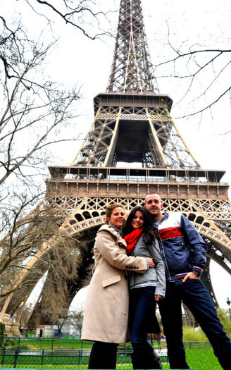 At the Eiffel tower with my Parents.I love Paris!