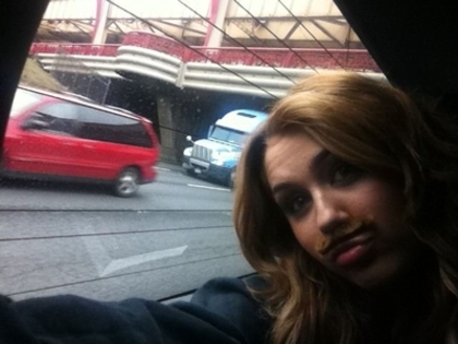 Bored in traffic soooo Im wearing a mustache winning DUH :)