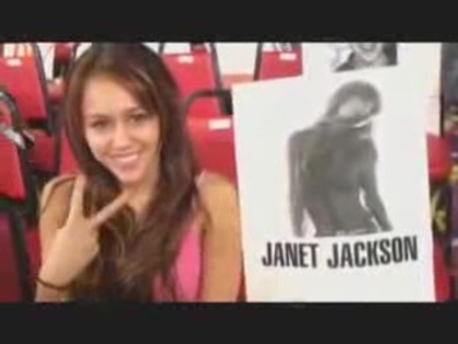miley cyrus with a poster of Janet Jackson (6) - miley cyrus with a poster of Janet Jackson