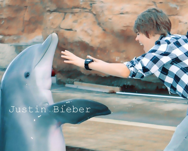 justin-justin-bieber-12747586-1500-1200 - Justin Bieber in water with dolphin