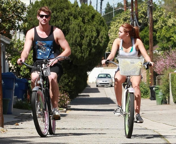 Miley+Cyrus+Liam+Hemsworth+Riding+Their+Bikes+1BSXfduKk5ol - Riding their bikes