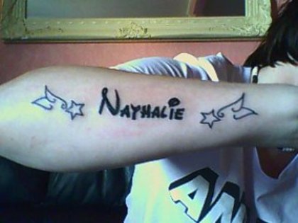 33989_10150221537665109_886490108_13251002_8214660_n; One off the tattoos =P
