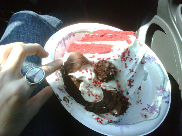 The most GINORMOUS piece of cake. It has my 6 from my Sweet 16 cake they gave me on set!! [[: