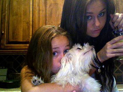 with my sis Miley and her dog - Me