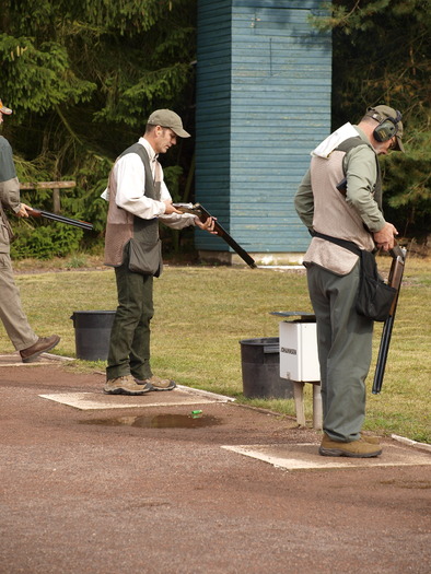 _9051369; Tom prepares to shoot on the trap range, Ed is on deck.
