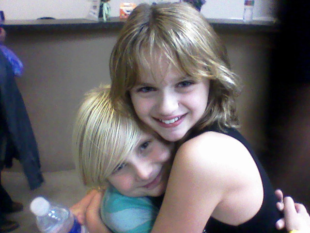 after bonding over autograph signing and gymnastics, we shared a nice hug at the end of the night!! - Me and Joey King
