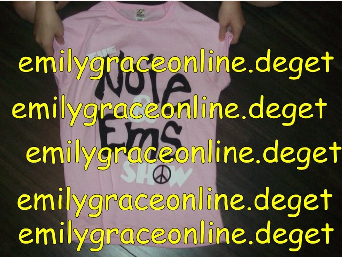 Me holding my NOIE AND EMS ( pink ) t-shirt - Some Proofs
