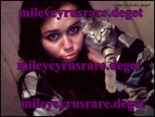 me and my cat - a very rare  pic with miley and her cat