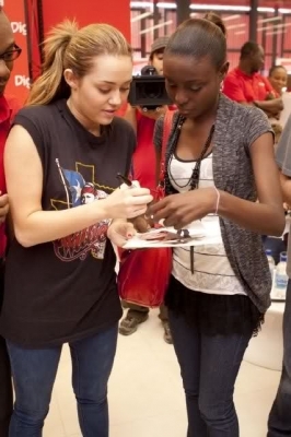 normal_012 - Signing Autographs in Haiti-miley