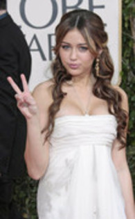 15824193_XRRECFEJV - miley cyrus Red carpet arrivals for 66th Annual Golden Globe Awards