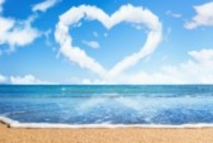 10331975-beach-and-sea-heart-of-clouds-on-sky-symbol-of-love