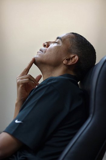 On a Saturday, the President listens during a conference call in the Situation Room on the Middle Ea