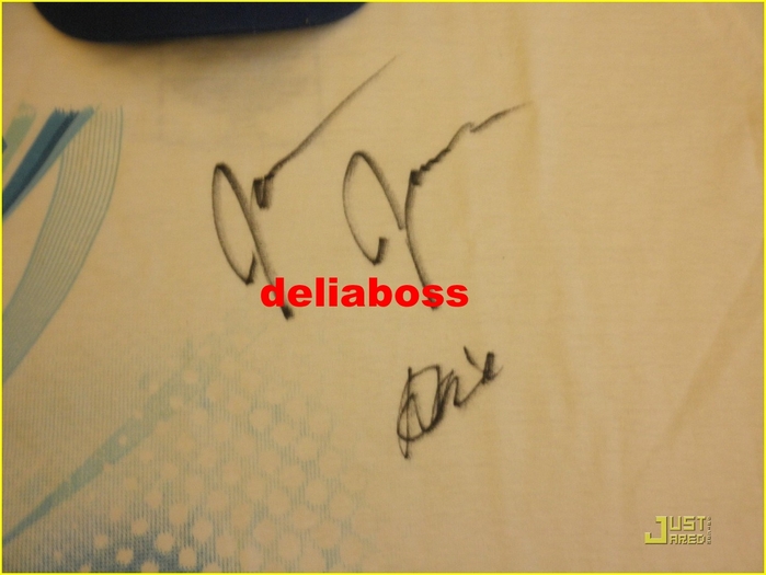 1 - a T-shirt signed by JOE and Demi