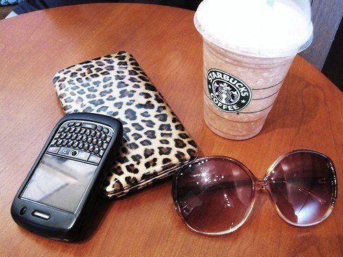 Starbucks coffee,blackberry,my little bag and glasses :D %u2665 I love it%u2665 - Proof x