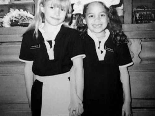 A Pic of Nicole and me at 8 years old dressed as conservative french maids for Halloween. haha, so c - me young