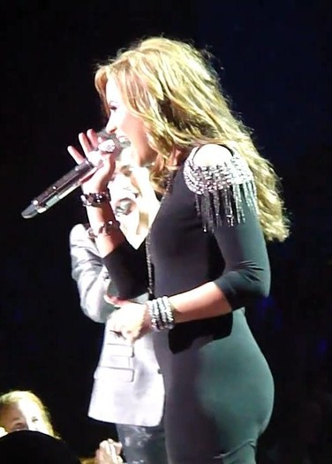  - Demz in a Tight Drees on Stage