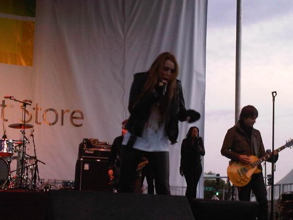 Performs At Microsoft Store Grand 12