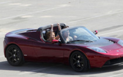 17025918_AZCWDVBGM - Miley Cyrus Photoshoot in a Tesla Roadster