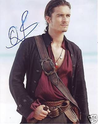 orlando-bloom-signed-pirates-of-carribean-8x10-wcoa_00561cc602a99c17567946b6256f91e1 - x - Orlando Bloom - x