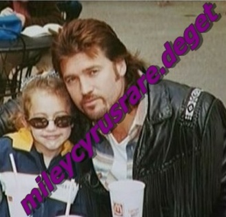 me and ddady - a very rare pic with little miley and her dad
