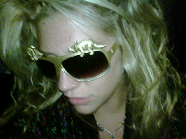 There is a gold dinosaur on my head. Finally - This is me