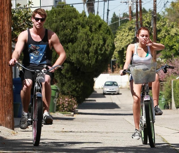 Miley+Cyrus+Liam+Hemsworth+Riding+Their+Bikes+H62_io5CSVbl