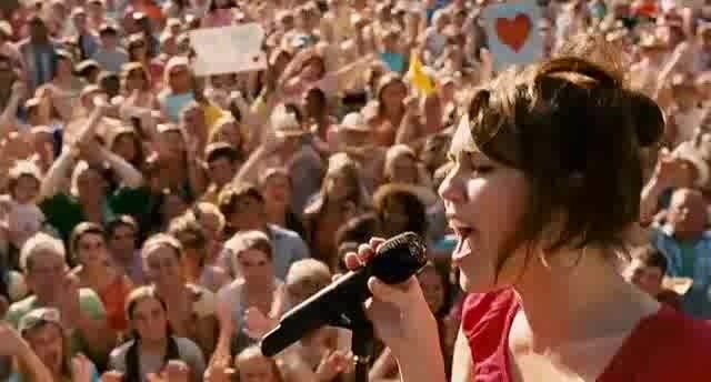 miley ray cyrus (2) - miley cyrus in hannah montana the movie singing the climb
