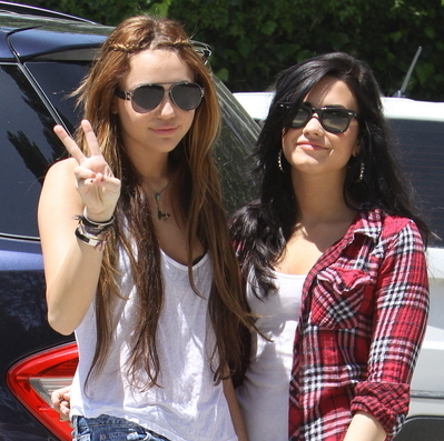 With Demi.