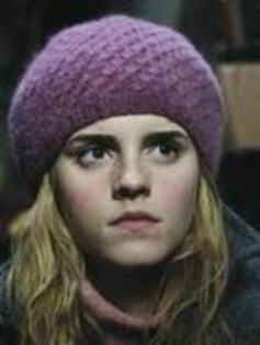 10 - Emma with hats
