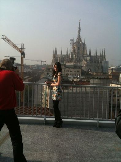 Pics of me doing a photoshoot on top of a building in front of the Duomo Cathedral