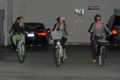 15823760_HBCNGNTBZ - Miley Cyrus on a Bicycle