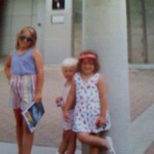 when i was little; Me 2 sisters and i at seaworld.
