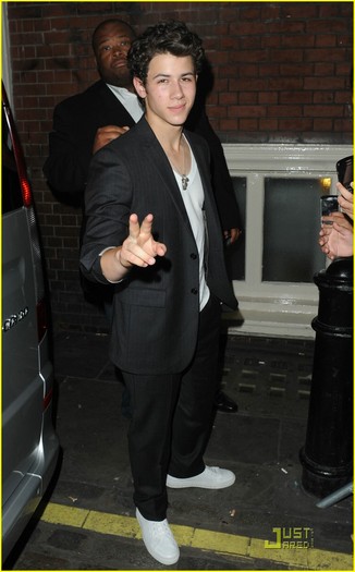 nick-jonas-lucie-stage-door-04 - Nick-out at queens theatre London