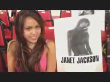 miley cyrus with a poster of Janet Jackson (8)