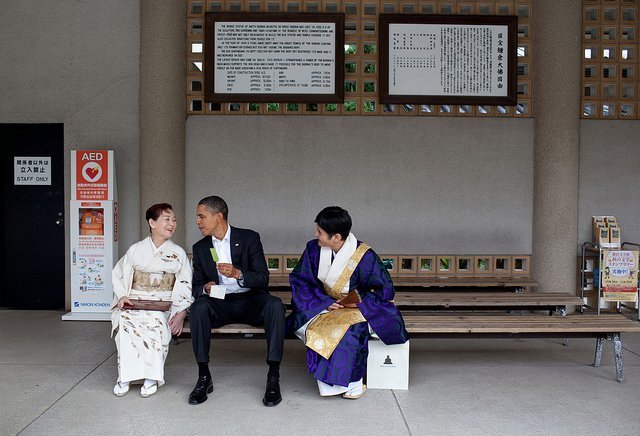 Visiting the Great Buddha of Kamakura, in Japan, the President had a green tea ice cream bar with hi