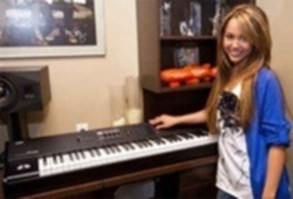 Miley plays the piano; Miley plays the piano
