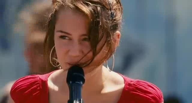 miley ray cyrus (4) - miley cyrus in hannah montana the movie singing the climb